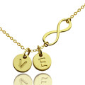 Gold plated infinity necklace with a disc initial charm