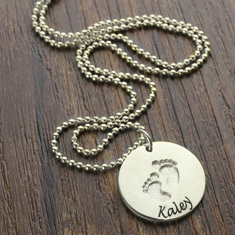 Engraved baby footprints name necklace product view