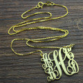 Scrolling Family Monogram Necklace Scrolling family monogram necklace with five initials