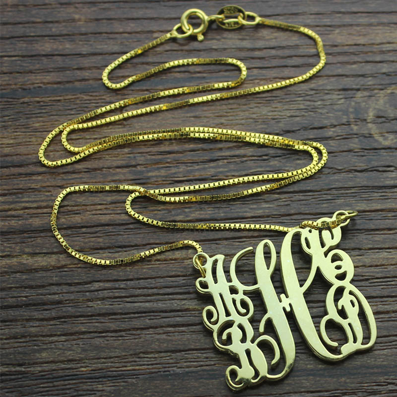 Scrolling Family Monogram Necklace Scrolling family monogram necklace with five initials