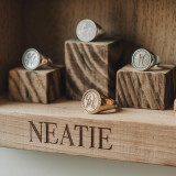 Neatie Gold Silver Infinity Symbol Pendants On Crafting Table