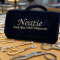 Neatie Jewelry Tools And Pendants On Crafting Table