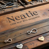 Neatie Jewelry Workbench With Infinity Pendants And Tools