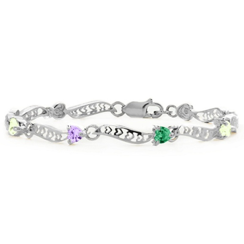 Personalised bracelet with embedded heart-cut stones
