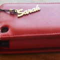 Personalised name charm for a mobile phone