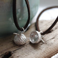 Sterling Silver Acorn Cup Pendant Sterling silver acorn cup pendant on a leather cord