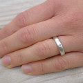Diamond Silver Ring Set Frosted silver diamond wedding rings shown together