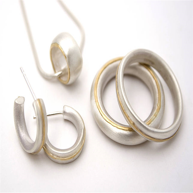 Silver and Gold Ring Group Silver and gold ring group product image