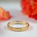 Bark effect ring pair detail view