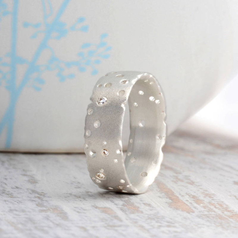 Diamond ring with multiple diamonds