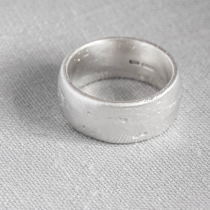 Domed sand cast wedding ring detail