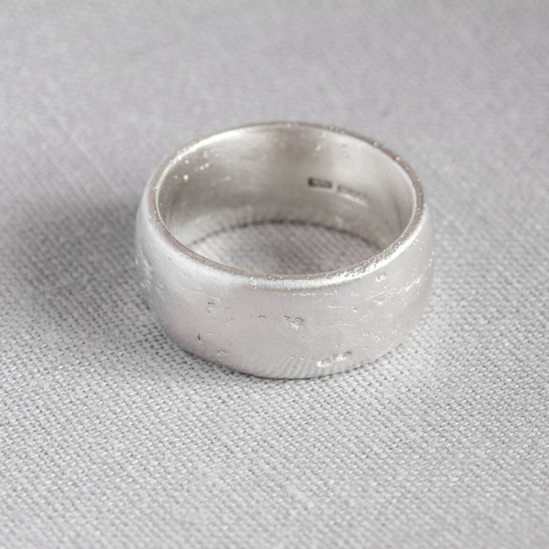 Domed sand cast wedding ring side view
