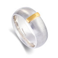 Linear Ring with a wide silver band and raised gold detail