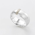Linear Ring with a wide silver band and raised gold detail