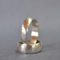Handmade silver wedding ring with hammered finish