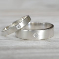 His and hers silver wedding rings product view