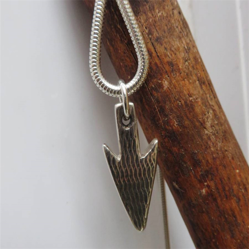 Hunters Moon silver arrowhead necklace close-up