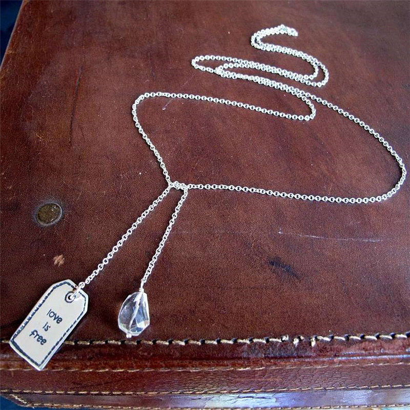 Fine Silver Lariat Label Detail Close view of fine silver lariat label tag