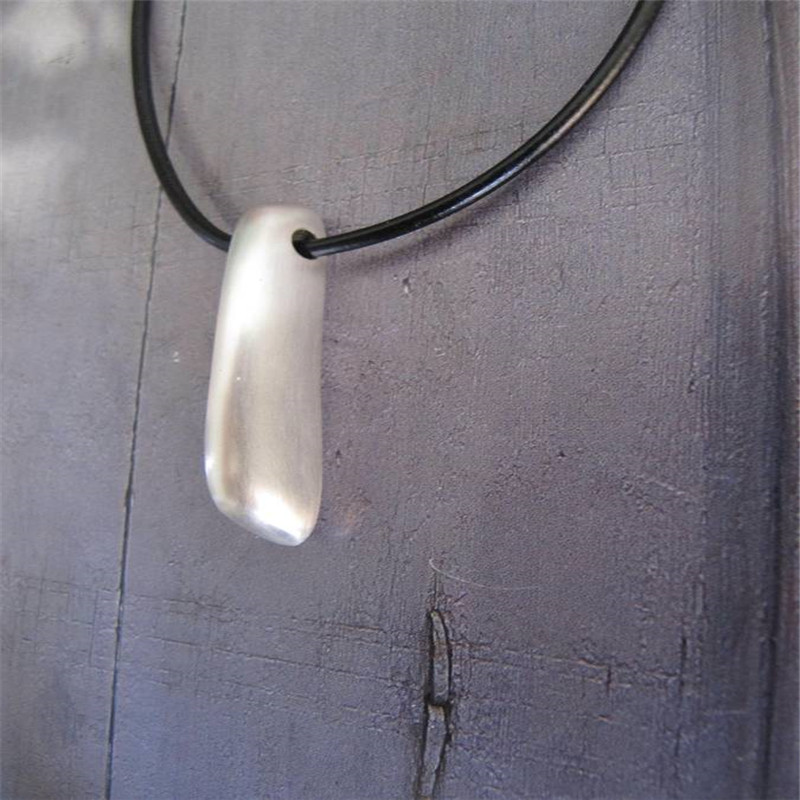 Long Heavy Silver Pendant Necklace Long heavy silver pendant necklace