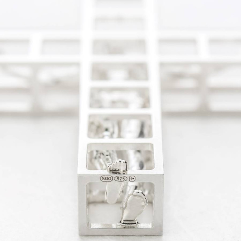 Man in a Cage Micromachined Pendant Man in a Cage micromachined pendant product image