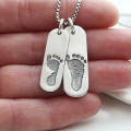 Double Footprint Tag Necklace Detail Double footprint tag necklace detail