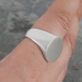 Men's solid silver circular signet ring view