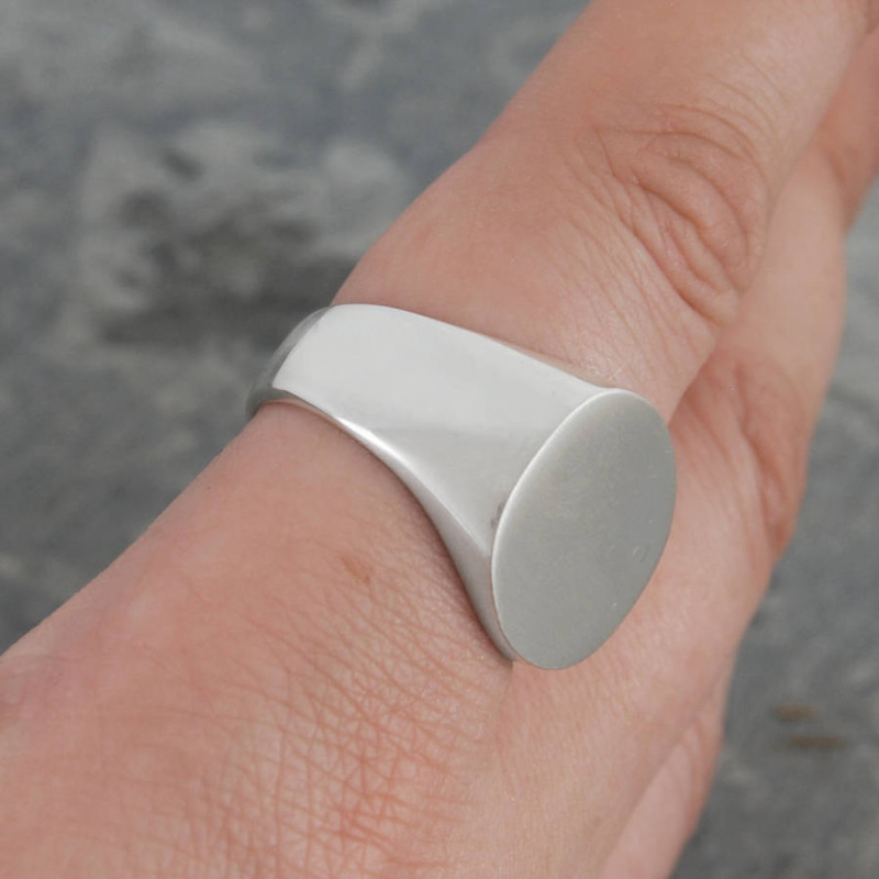 Men's solid silver circular signet ring view