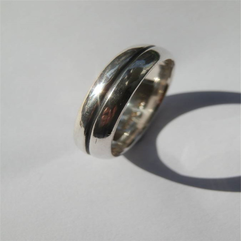 Men's silver oxidized band ring