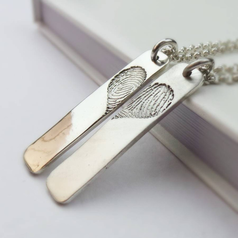 Pair of Inked Fingerprint Heart Pendant Necklaces Pair of inked fingerprint heart pendant necklaces