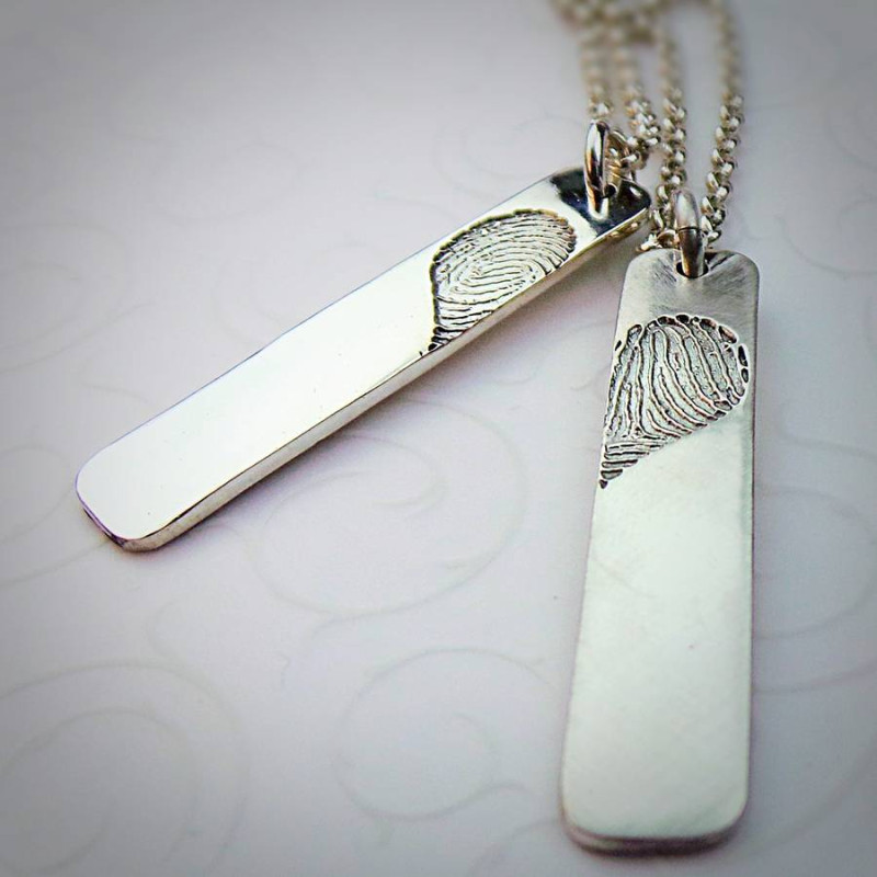 Pair of Inked Fingerprint Heart Pendant Necklaces Pair of inked fingerprint heart pendant necklaces