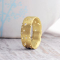 Patterned 18ct Gold Band Patterned 18ct gold band ring
