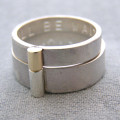 Personalised silver and gold his and hers rings