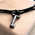 Personalised silver key pendant necklace detail