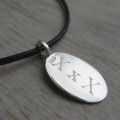 Silver Tag & Leather Cord Necklace Silver tag and leather cord necklace