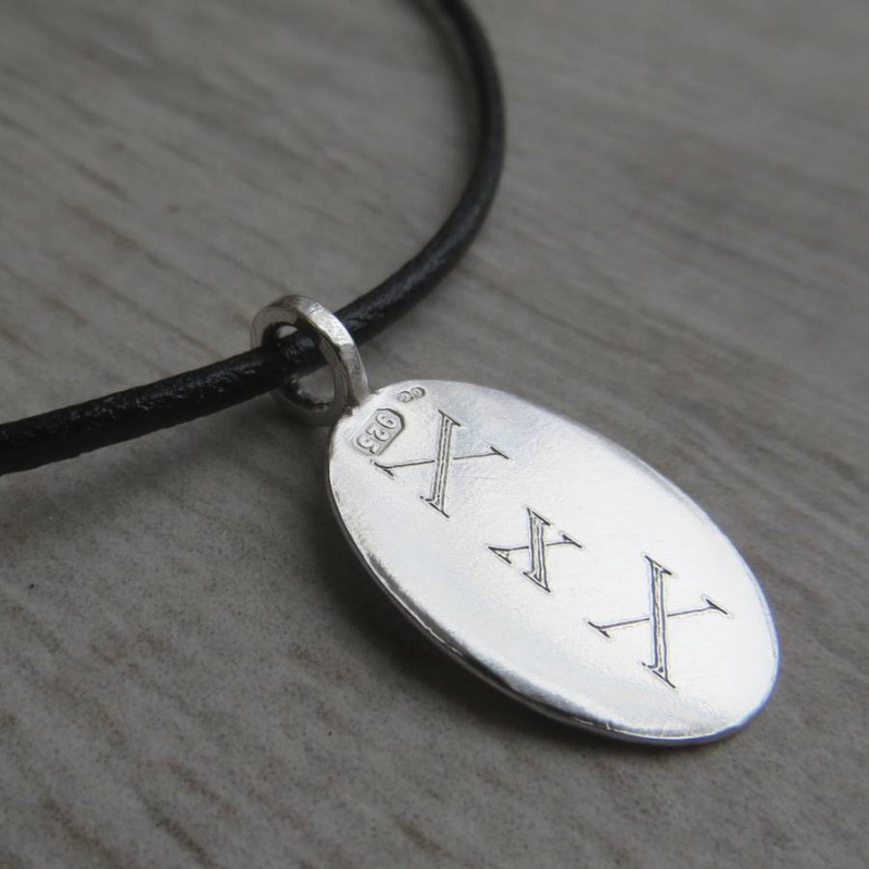 Silver Tag & Leather Cord Necklace Silver tag and leather cord necklace