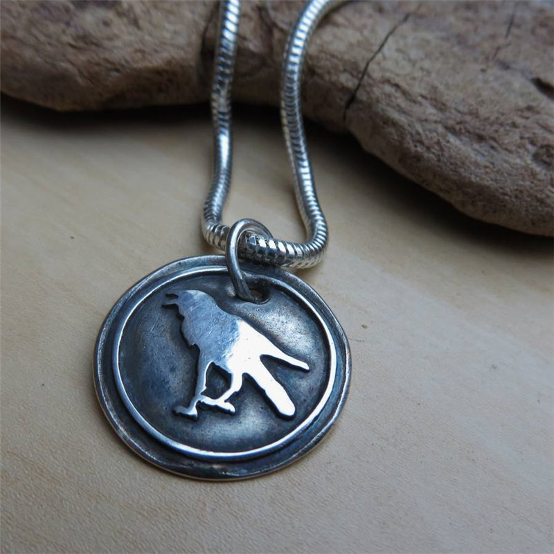 Raven Silver Pendant Raven Silver Pendant on a snake chain