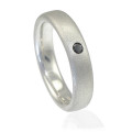 Men's black diamond ring side view