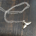 Silver whale tail pendant necklace