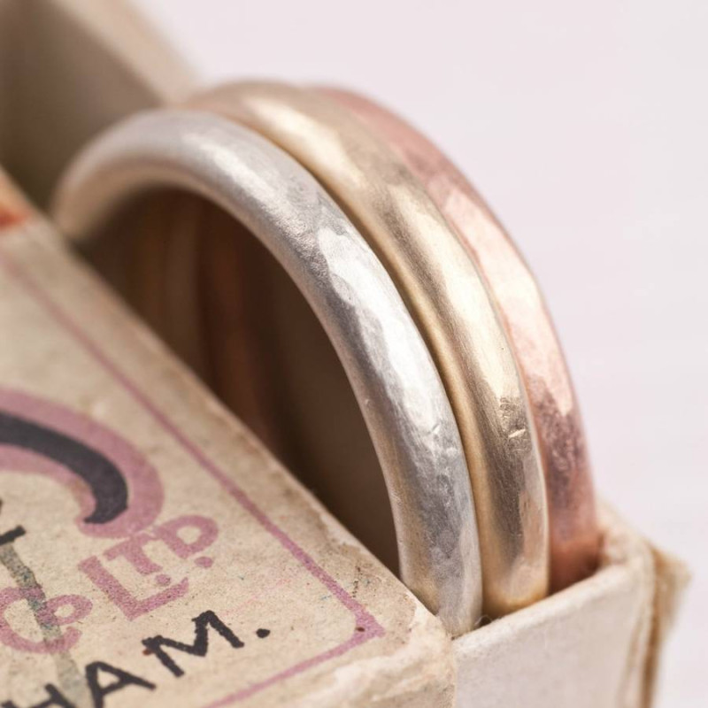 Textured solid gold halo band