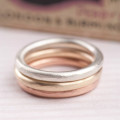 Textured solid gold halo band