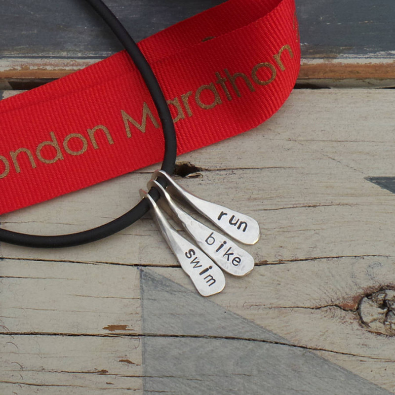 Handmade Triathlon Swim Bike Run Necklace with hand-stamped paddle lettering