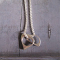 U And Me To Infinity Silver Oval Pendant Necklace Two silver oval pendants on a woven necklace chain