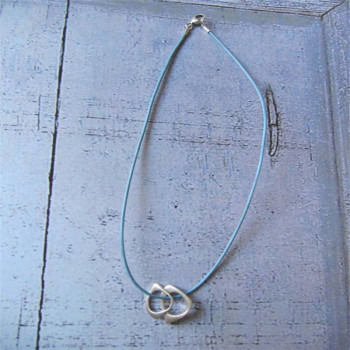 U And Me2 Infinity Silver Pendants On Leather U And Me2 Infinity Silver Pendants On Leather