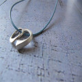 U & Me2 infinity pendants on leather necklace product image