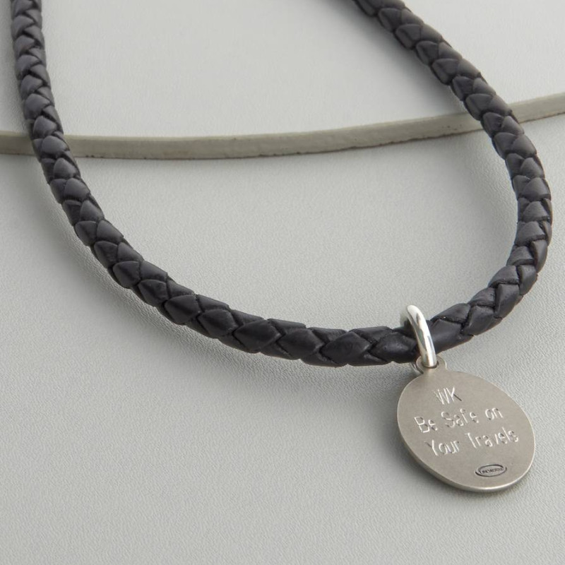 Woven leather and St Christopher necklet detail